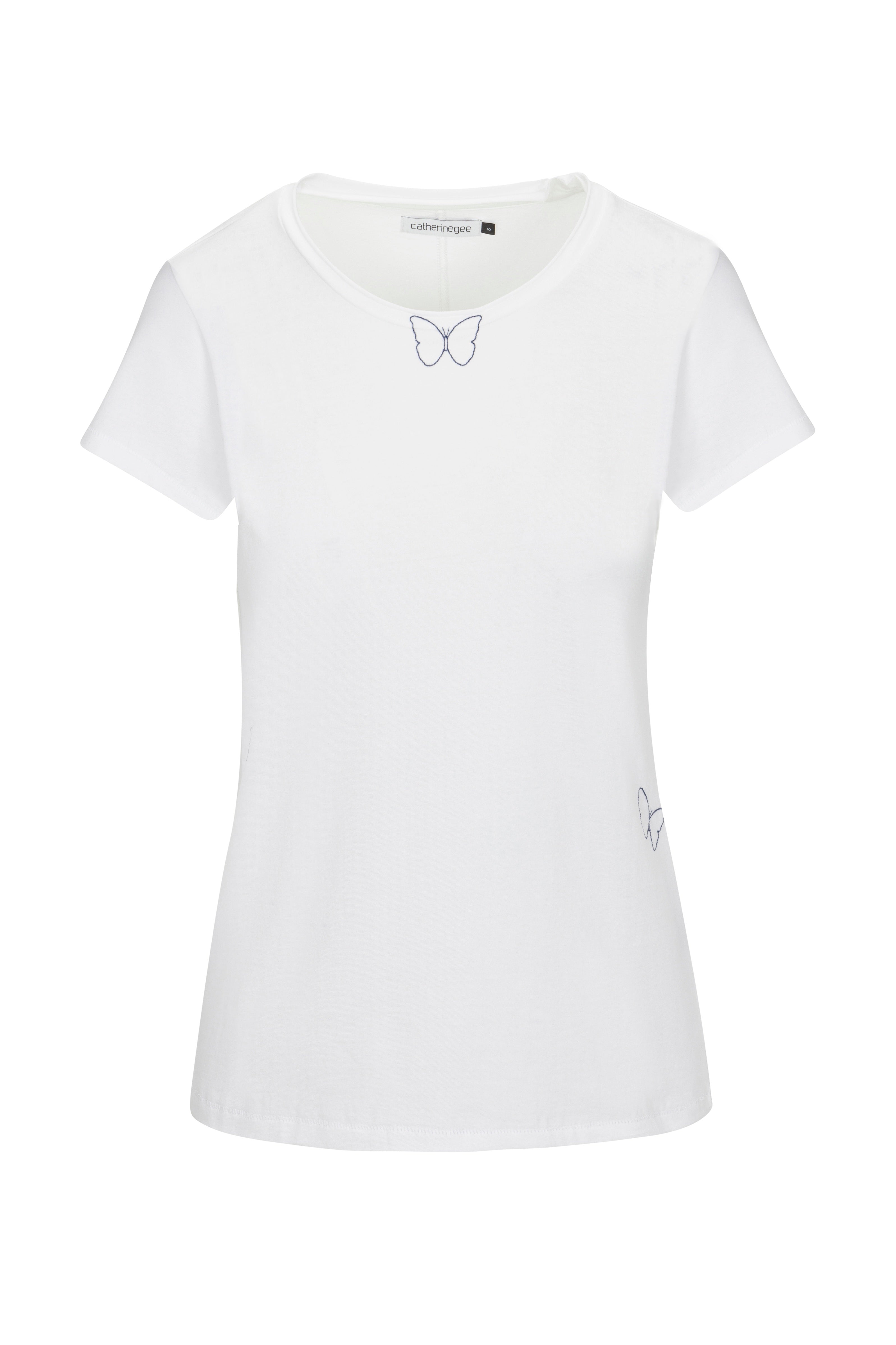 Catherine Gee Embroidered Cotton Butterfly White T-Shirt. This elegant t-shirt features two small embroidered butterflies—one near the neckline and the other on the lower right side. The shirt has a classic round neckline and short sleeves, offering a simple yet stylish look. Made from soft, high-quality cotton, it's a versatile piece that's perfect for any wardrobe, blending comfort with a touch of whimsy.