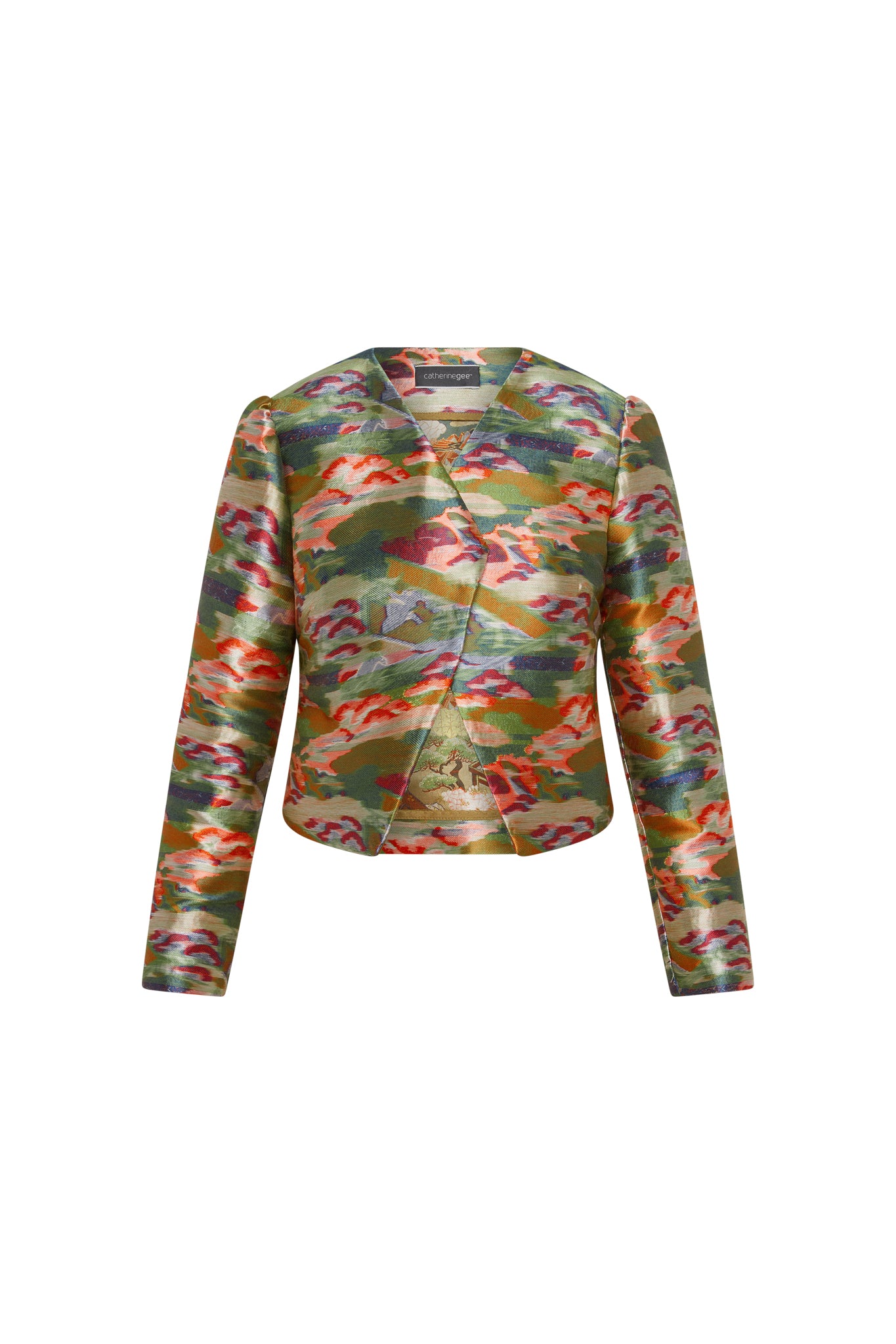 Catherine Gee Chloe Blazer - Camo Garden. The blazer features a vibrant camouflage design with shades of green, orange, red, and purple. It has a tailored fit with a wrap-style front and long sleeves.