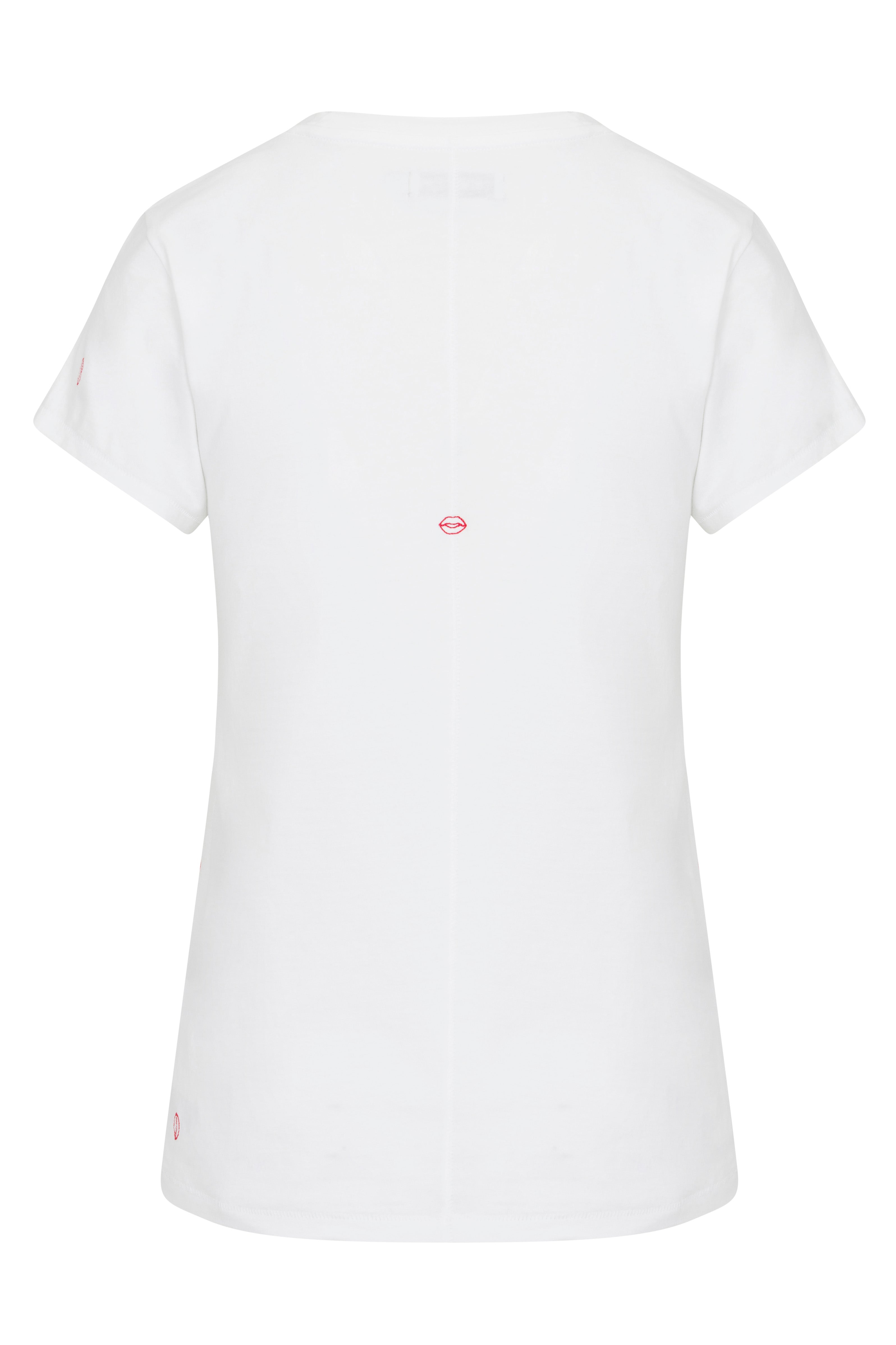 Back-view of white color Catherine Gee Embroidered Cotton Bisou T-Shirt features a round neckline and short sleeves for a classic look. The back showcases an adorable red embroidered "bisou" motif near the center, adding a playful touch and a small red detail near the bottom hem on the left side, emphasizing the shirt's unique design. Made from 100% pima cotton, offers maximum comfort and breathability, perfect for everyday wear.