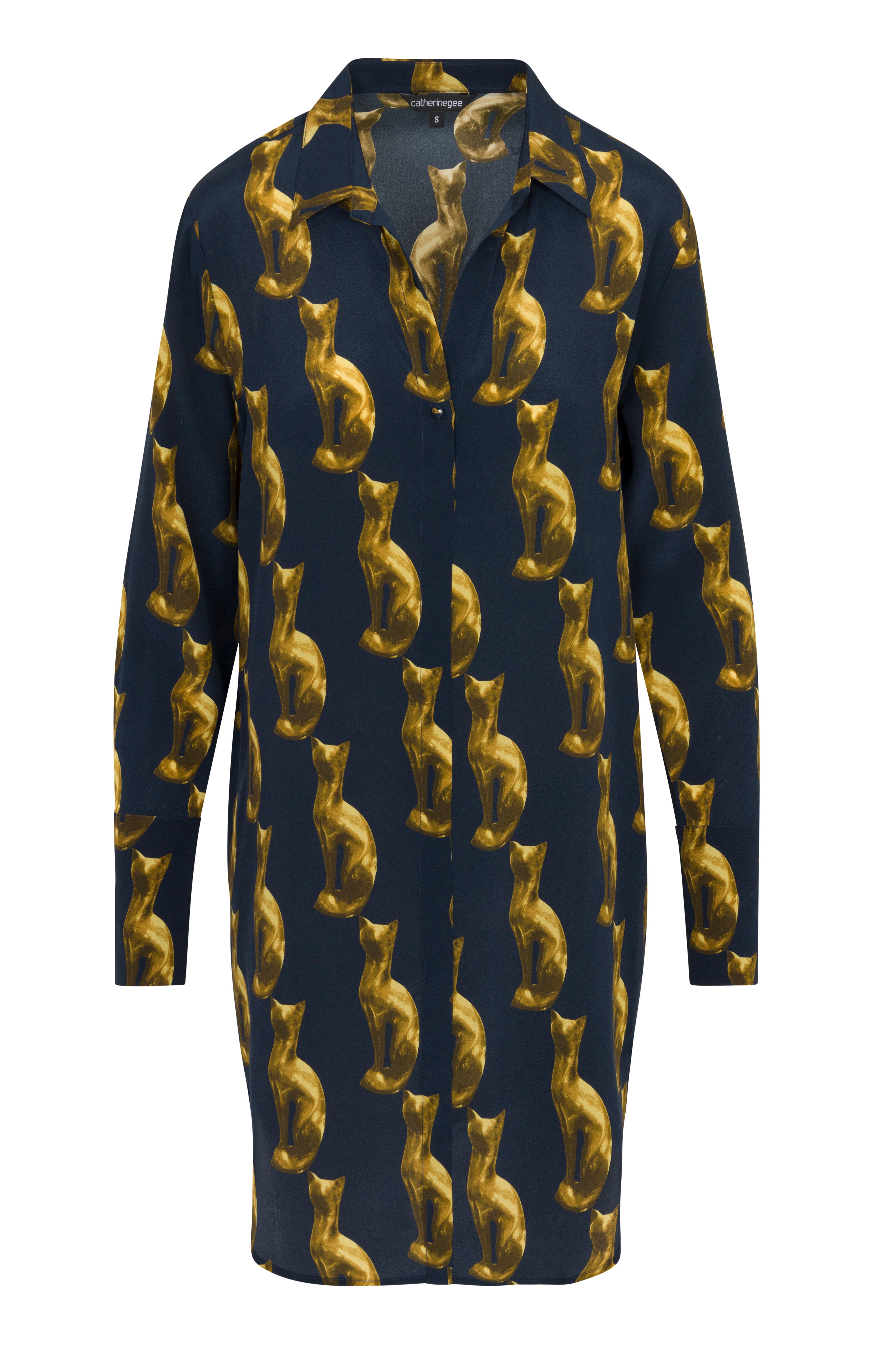 Catherine Gee Daria Dress - Cat. A long-sleeved, button-down dress with a collar, featuring a repeating pattern of golden cats on a dark background.