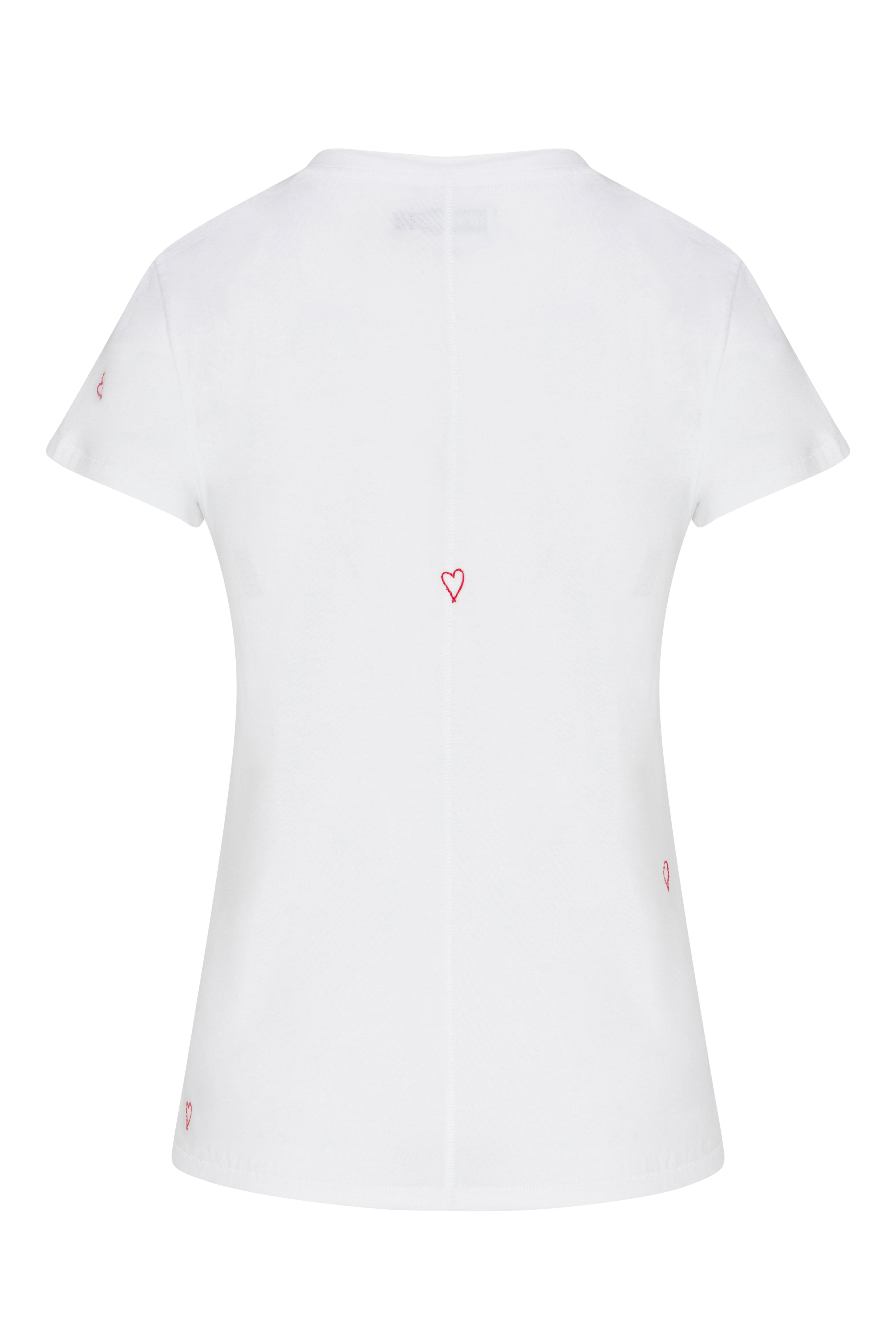 Back-view of a white color Catherine Gee Embroidered Cotton Red Heart T-Shirt features small, red embroidered hearts in various locations: one in the center of the back, one on each sleeve, and two near the bottom sides. The design is simple yet elegant, with the red hearts adding a subtle, charming detail to the plain white fabric, making it a versatile piece for casual wear.