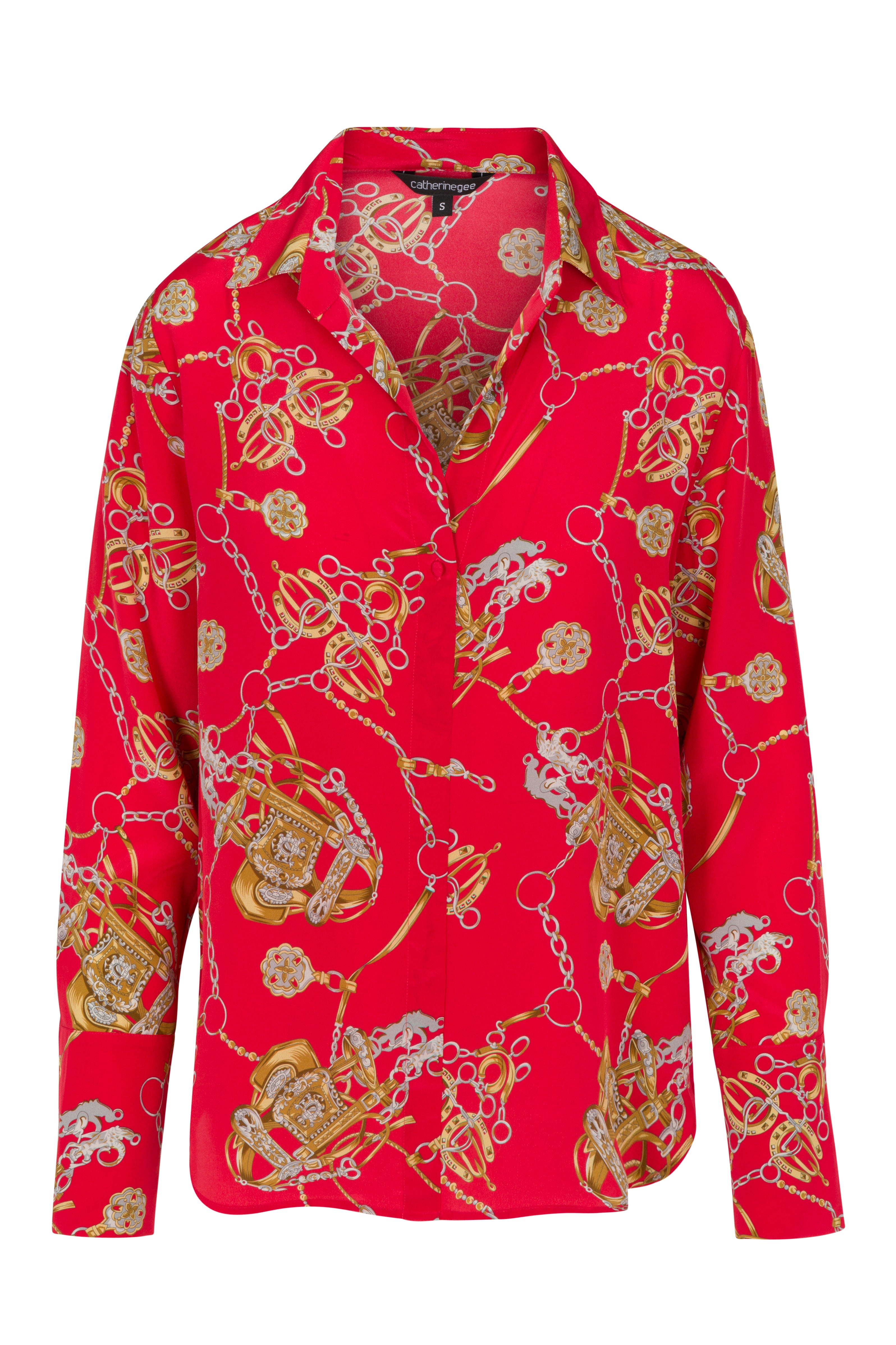 Catherine Gee Daria French Cuff Silk Blouse Faena Red features a vibrant red color with an intricate pattern of gold chains and ornate designs on a plain white background highlighting the design and fit of the blouse.