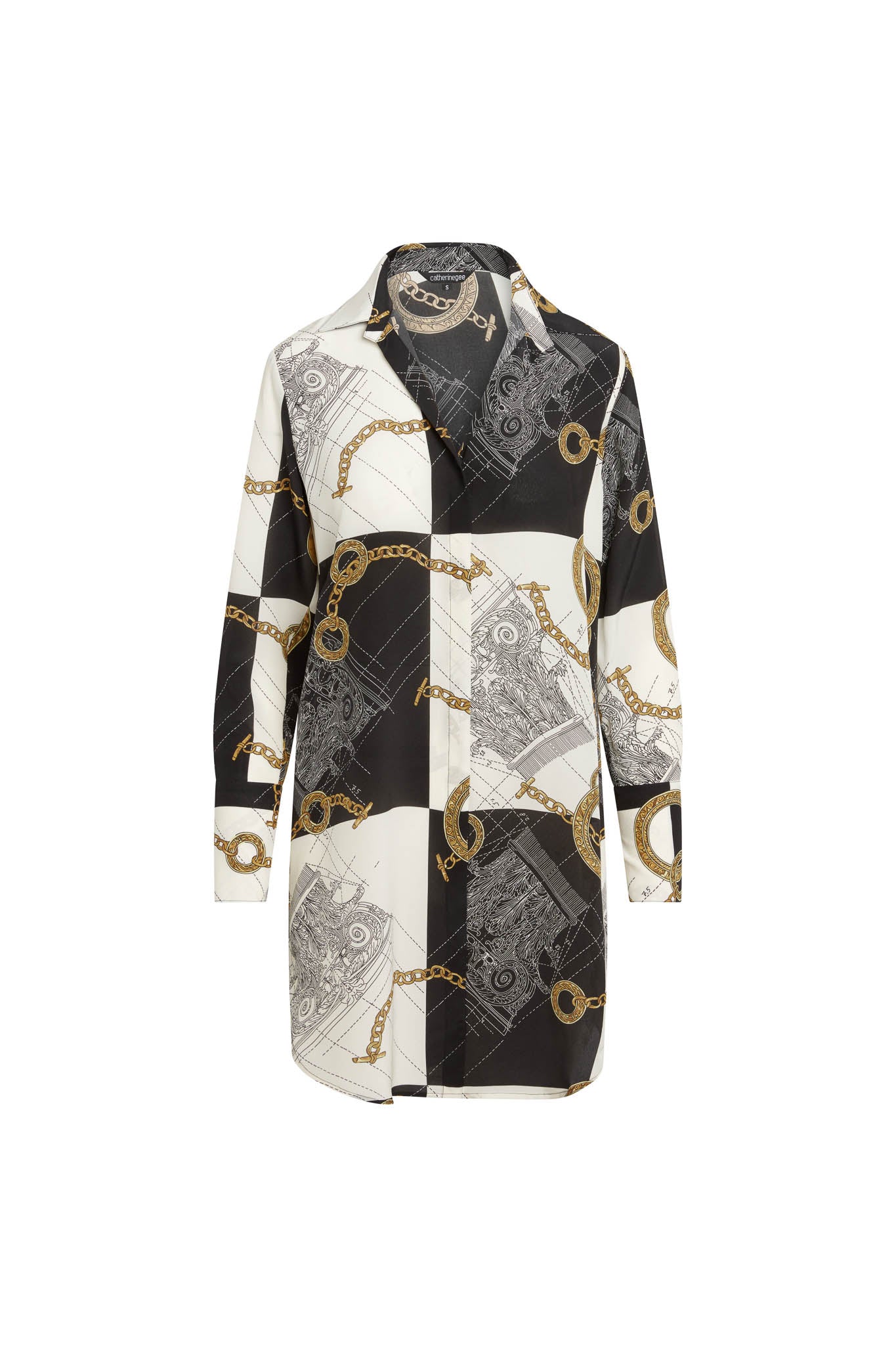 Catherine Gee Daria Silk Shirt Athens dress features a long-sleeve design with a button-down front and a classic collar. The fabric is decorated with a black and white patchwork pattern, interspersed with intricate gold chains and architectural print details, giving it a luxurious and sophisticated look. The dress combines elegance with a modern twist, making it a versatile piece for various occasions.