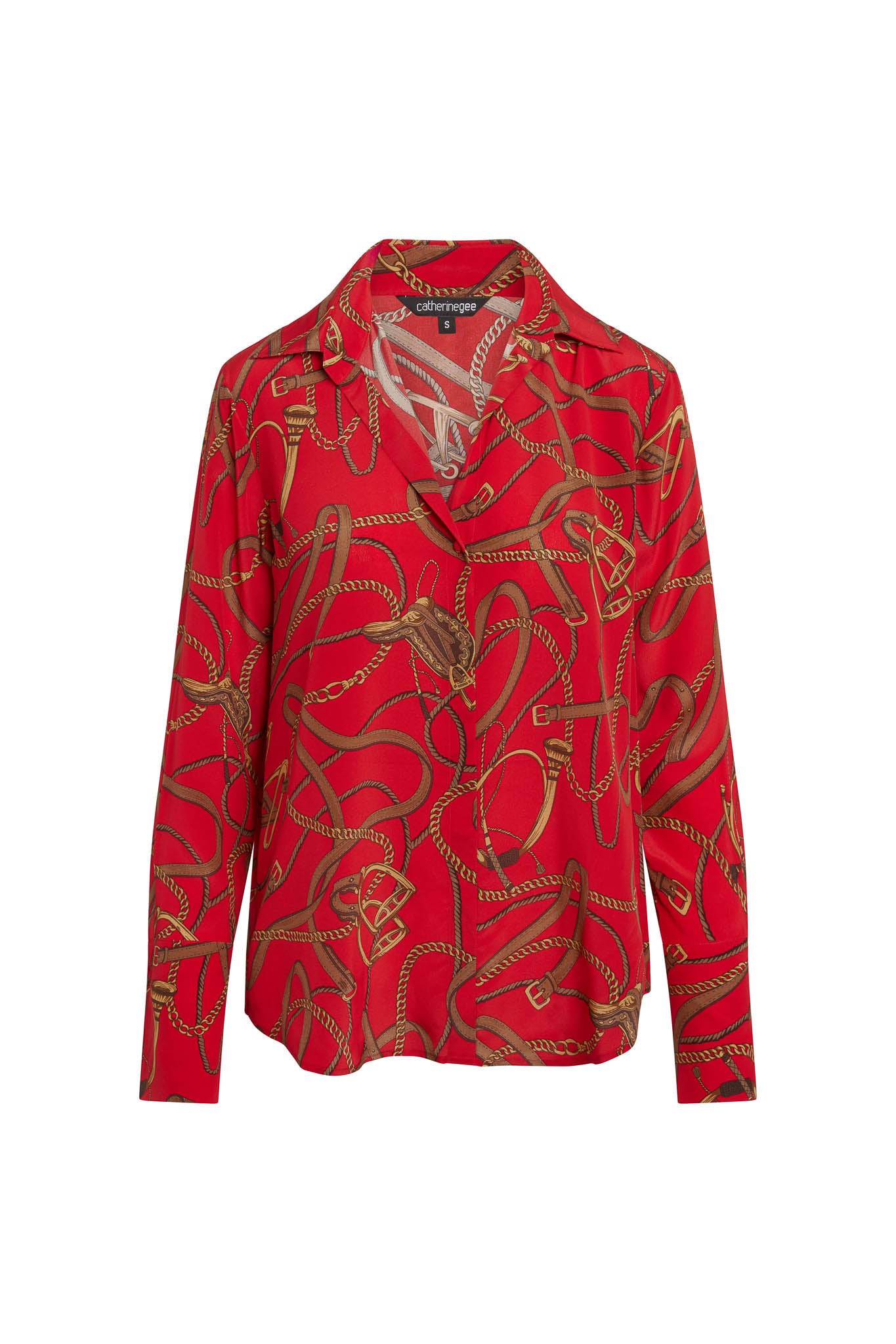 Catherine Gee Daria French Cuff Silk Palermo blouse features a red with an intricate pattern of gold and brown chains and ropes in a classic collar and long sleeves with French cuffs. The design is elegant and sophisticated, making it a stylish choice for various occasions. The silk material adds a luxurious touch to the garment.