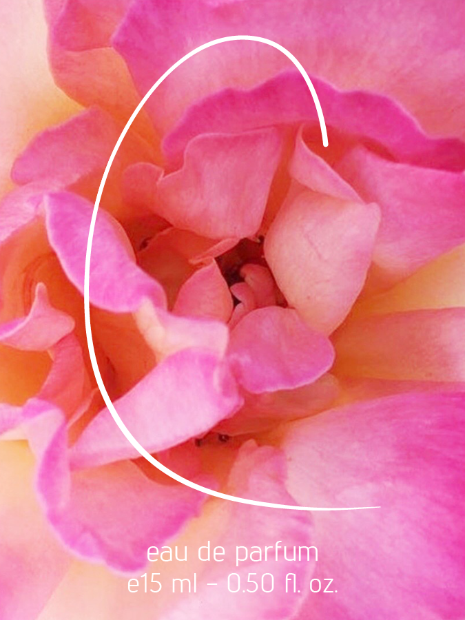 Close-up image of pink and peach-colored flower petals with white text overlay reads 'eau de parfum e15 ml - 0.50 fl. oz.' A white curved line is also overlaid on the image. The vibrant colors and detailed texture of the petals make the image visually appealing.