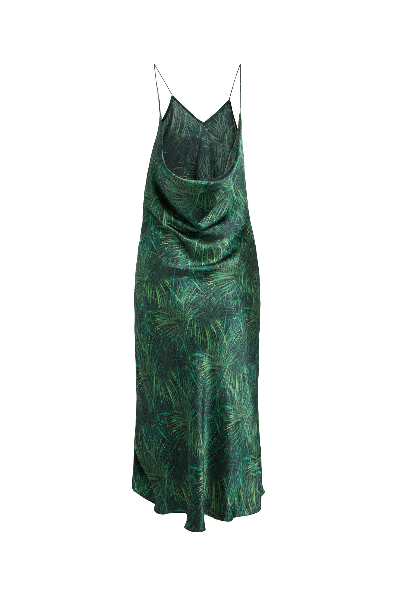 A green palm print Celeste cowl back slip dress by Catherine Gee with thin spaghetti straps. The dress features a subtle, abstract pattern resembling grass or foliage.