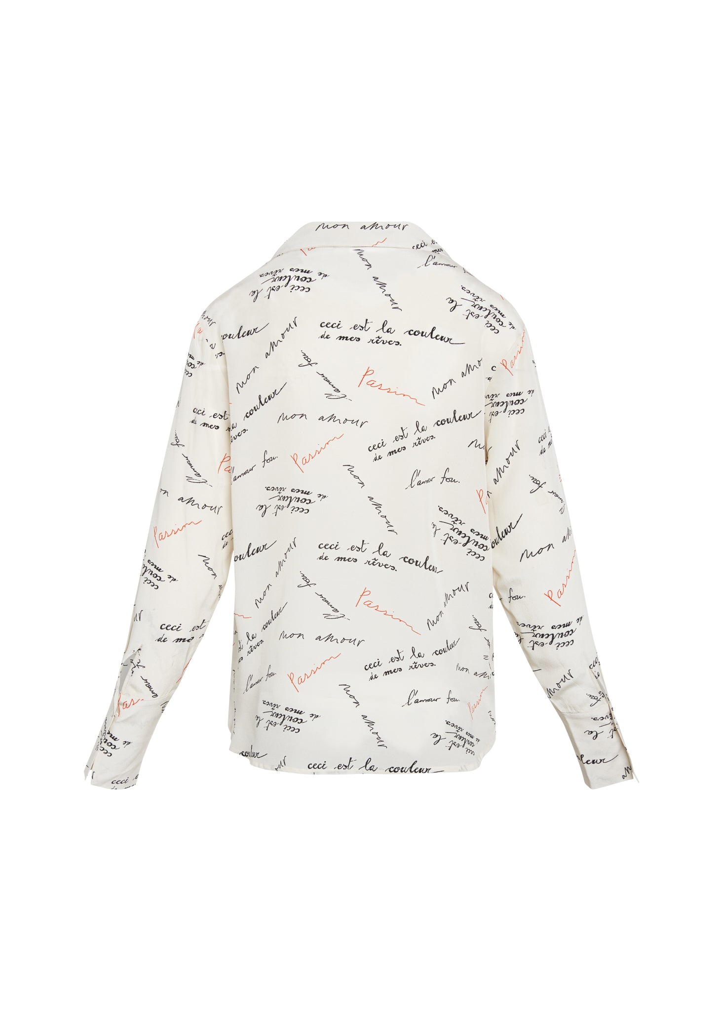 Back-view of a Catherine Gee Daria French Cuff Silk Passion Print blouse features a white base color with an all-over print of handwritten text in various colors, including black and red appears to be in French, with phrases such as "Passions" and "Ceci est la couleur de mes rêves" The blouse has long sleeves with French cuffs and a classic collar. The design is elegant and sophisticated, making it a stylish choice for various occasions.