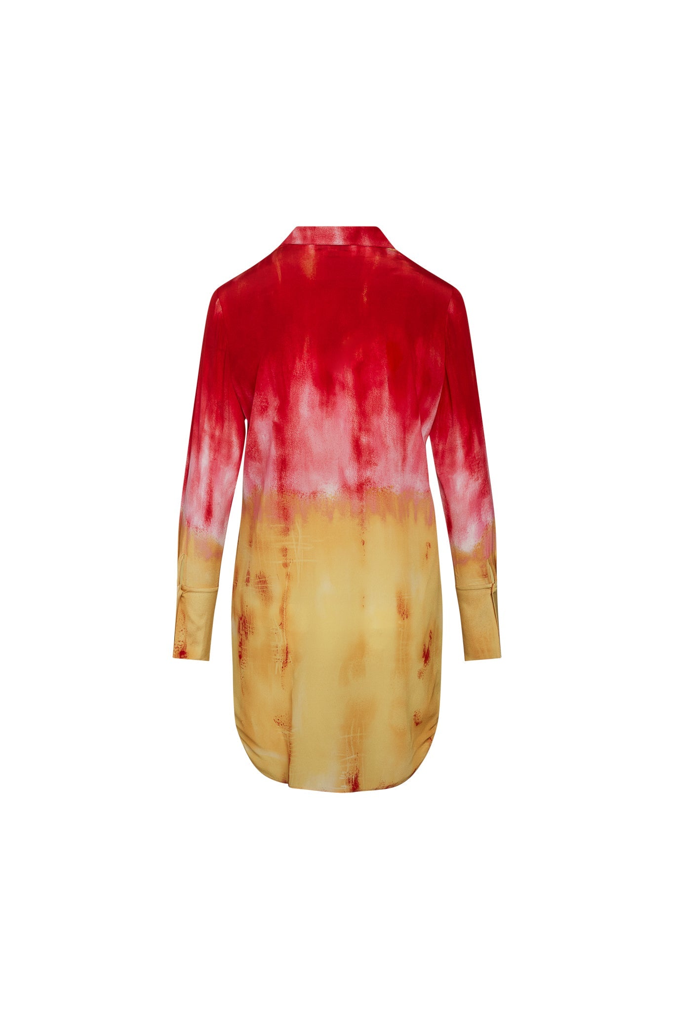 Back-view of the Catherine Gee Daria Silk Shirt Santa Barbara Sunset dress features a stunning gradient color scheme, transitioning from deep red at the top to warm yellow at the bottom, resembling a sunset. It has long sleeves, a collar, and a slightly curved hemline, creating an elegant and flowing silhouette. The vibrant, unique color pattern makes it a visually striking choice for any fashion enthusiast.