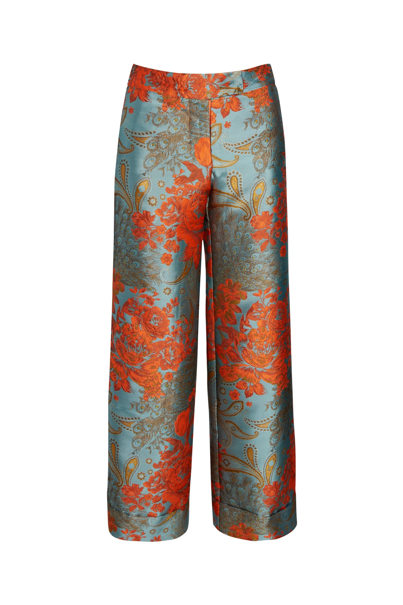 A pair of Catherine Gee Jacquard Stella Blue/Orange Pants. These high-waisted, wide-leg pants feature an intricate floral and paisley jacquard pattern in striking blue and vibrant orange hues. The jacquard fabric adds a luxurious texture, making these pants a standout piece in any wardrobe.