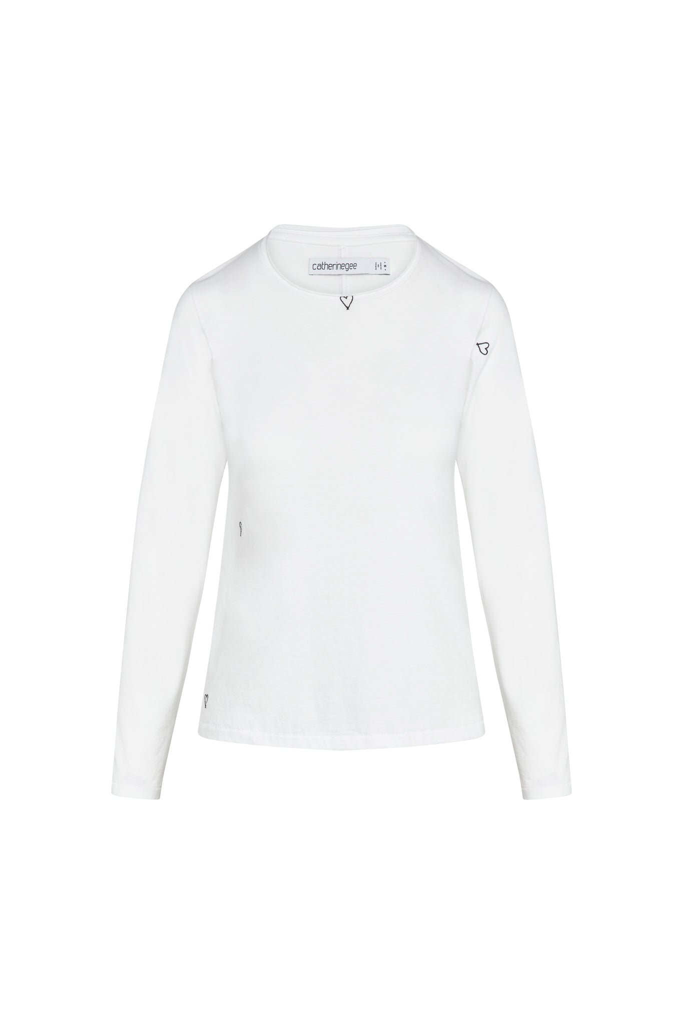 Catherine Gee Embroidered Cotton white Long Sleeve Heart T-Shirt features a minimalist design with a round neckline. The main attraction is the small, charming embroidered heart detail, located near the neckline. The soft cotton fabric ensures maximum comfort and breathability, making this shirt a versatile and stylish choice for casual wear. The simplicity of the design is enhanced by the subtle, yet elegant embroidery.
