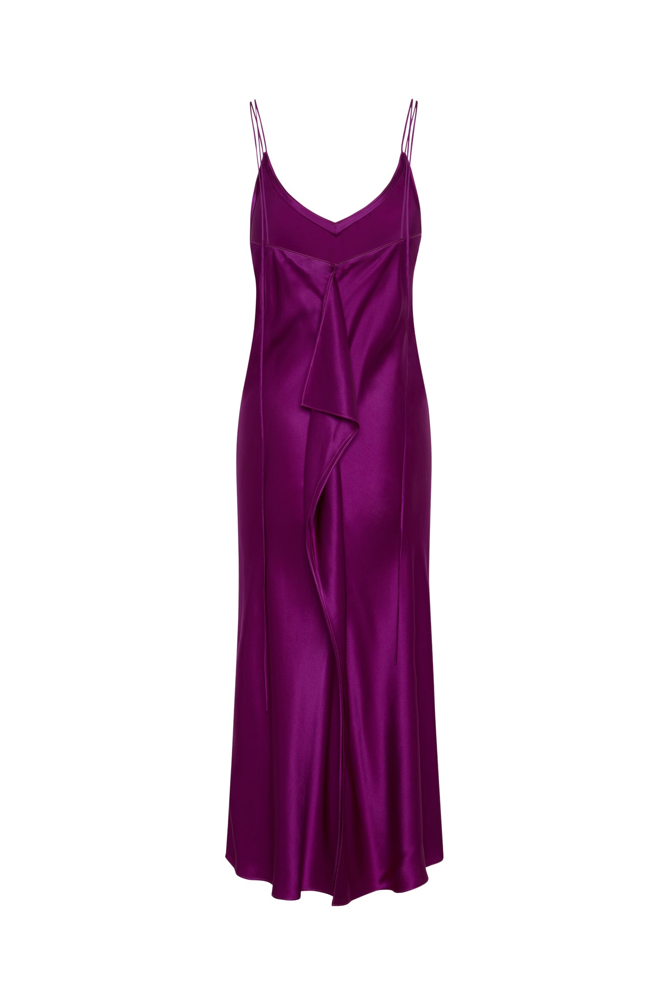 Back-view of Catherine Gee Emma Electric Orchid Slip Dress. This elegant dress features a vibrant electric orchid color and is designed with thin spaghetti straps, has a V-neckline and a distinctive draped ruffle detail down the front, adding a touch of sophistication. The fabric appears to be silky and smooth, giving it a luxurious and flowing appearance.