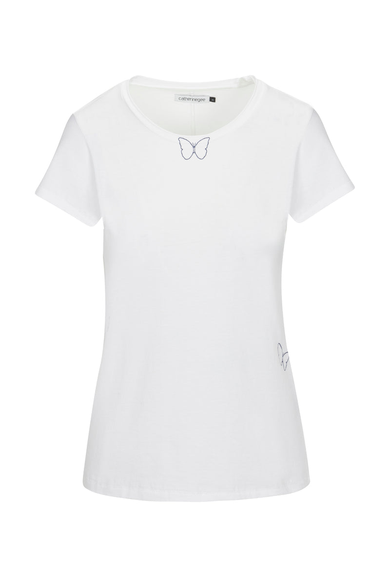 Catherine Gee Embroidered Cotton Butterfly White T-Shirt. This elegant t-shirt features two small embroidered butterflies—one near the neckline and the other on the lower right side. The shirt has a classic round neckline and short sleeves, offering a simple yet stylish look. Made from soft, high-quality cotton, it's a versatile piece that's perfect for any wardrobe, blending comfort with a touch of whimsy.