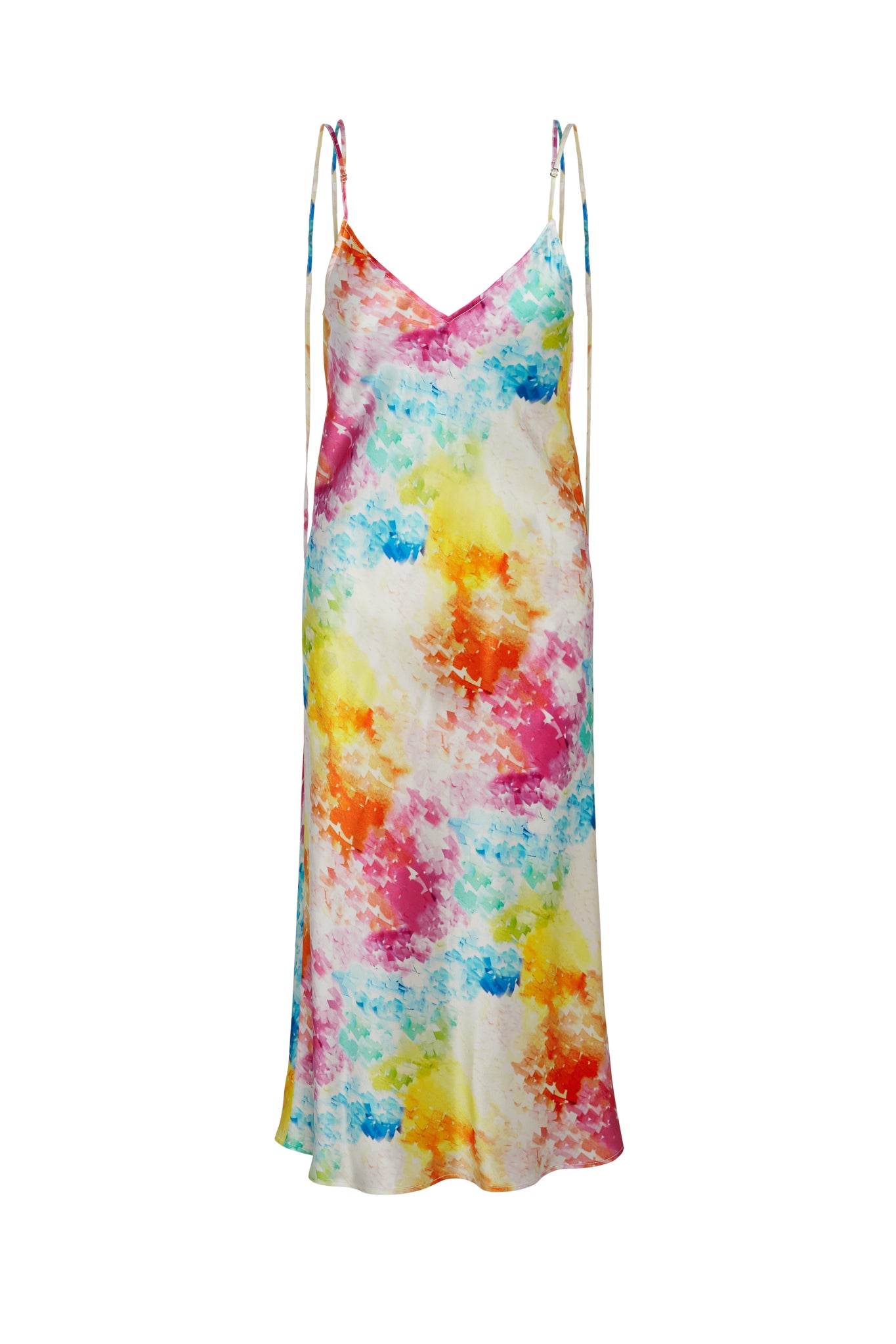 Catherine Gee Emma Rainbow Moodboard Slip Dress. This dress features a vibrant, multicolored pattern with splashes of red, yellow, orange, pink, blue, and green on a white background. It has a V-neckline and thin spaghetti straps, giving it a delicate and elegant appearance. The dress is long and flows down to the ankles, making it suitable for various occasions. The colorful design and lightweight fabric make it a standout piece in any wardrobe.