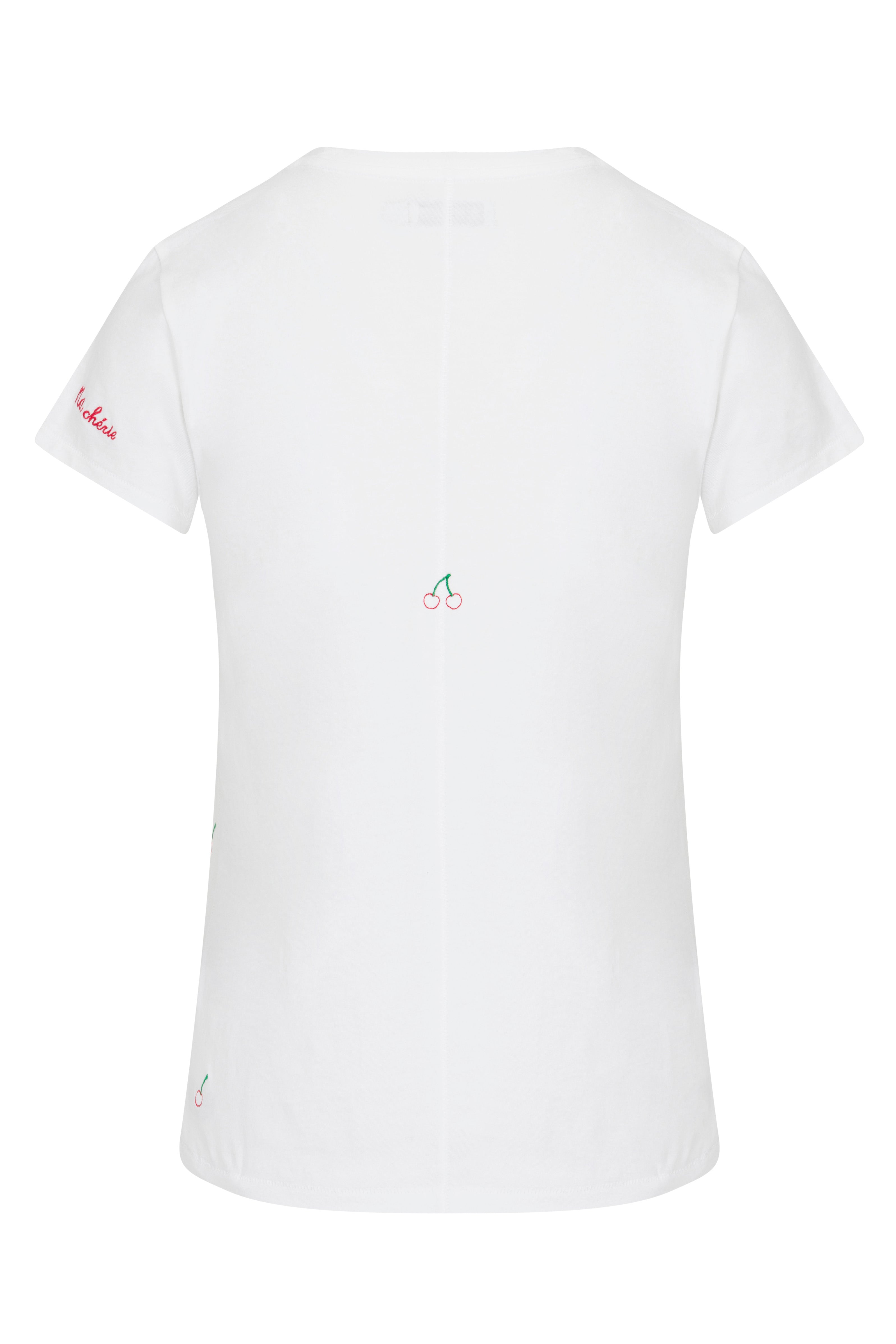 Back-view of a Catherine Gee Embroidered Cotton Cherry white t-shirt features a small embroidered cherry design in the center of the back and another near the bottom left side. The left sleeve has the word "cherries" embroidered in red and has a simple, clean design with playful details that add a touch of charm, making it an ideal choice for a stylish, casual outfit.