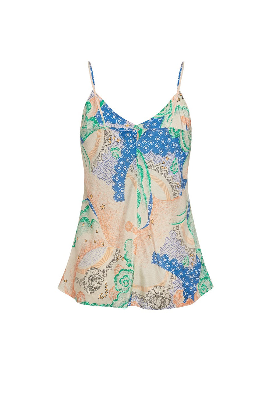 A back view of Catherine Gee Basic Cami - Siena features a colorful, abstract design with shades of blue, green, peach, and beige. It has thin spaghetti straps and a V-neckline with a small tie detail at the center front. The fabric appears lightweight and flowy, suitable for warm weather.