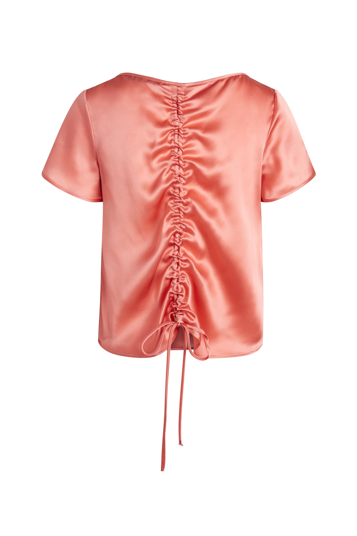 Catherine Gee Cate Ruched Back Shirt in a shiny, coral-colored fabric features short sleeves and a distinctive ruched design down the center of the back, ending in a tie at the bottom.