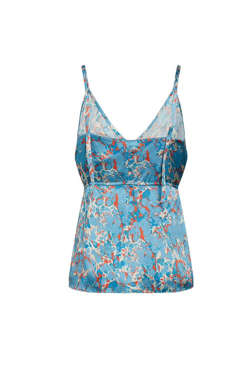 A back view of a blue and red patterned tank top with thin straps, known as the Catherine Gee Catherine Tank - Corfu.