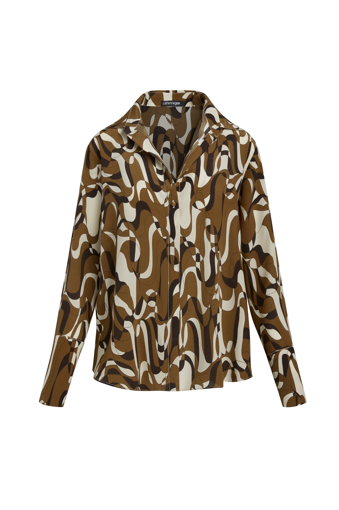 Catherine Gee Daria French Cuff Silk Blouse Barcelona features a bold, abstract pattern in shades of brown, white, and black. It has a classic collar, long sleeves with French cuffs, and a button-down front.