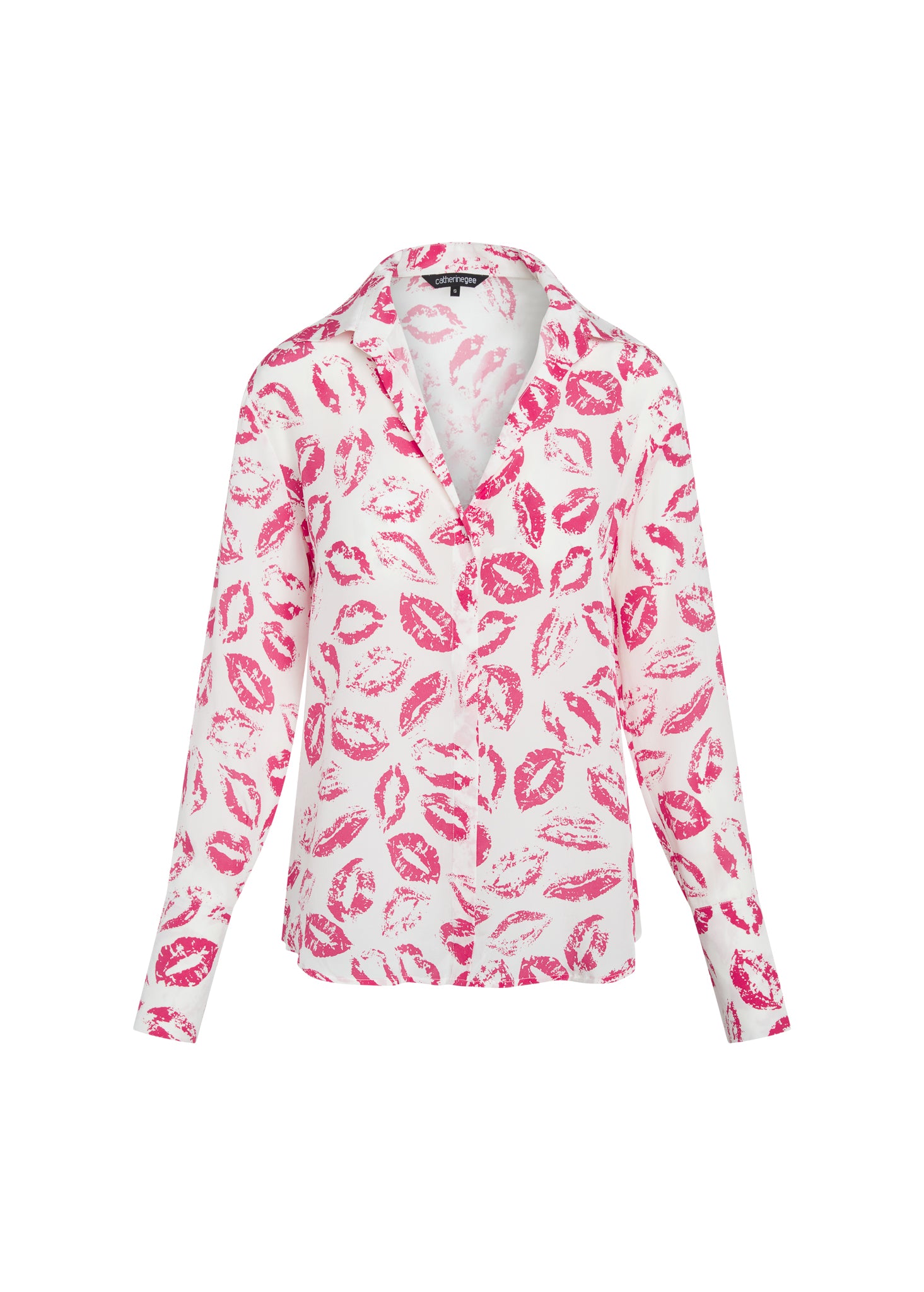 Catherine Gee Daria French Cuff Silk-Hot Pink Lips blouse featuring a vibrant pattern of hot pink lips on a white background. The blouse has a classic collar and long sleeves with French cuffs, creating a stylish and bold fashion statement.