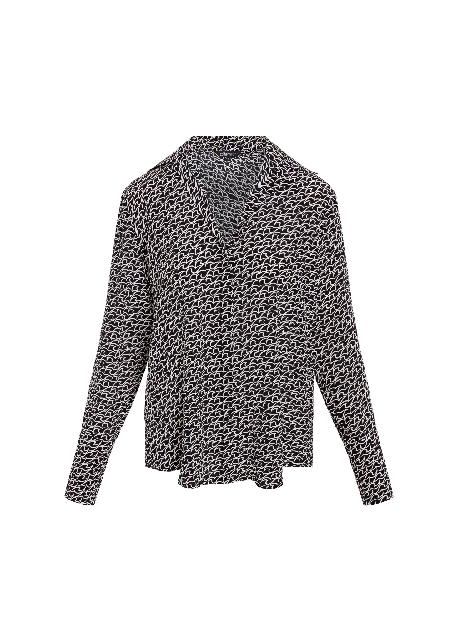 Catherine Gee Daria French Cuff Silk-Florence Print blouse features a black and white geometric pattern with long sleeves and a V-neckline. The fabric appears lightweight and flowy, suitable for a sophisticated and elegant look.