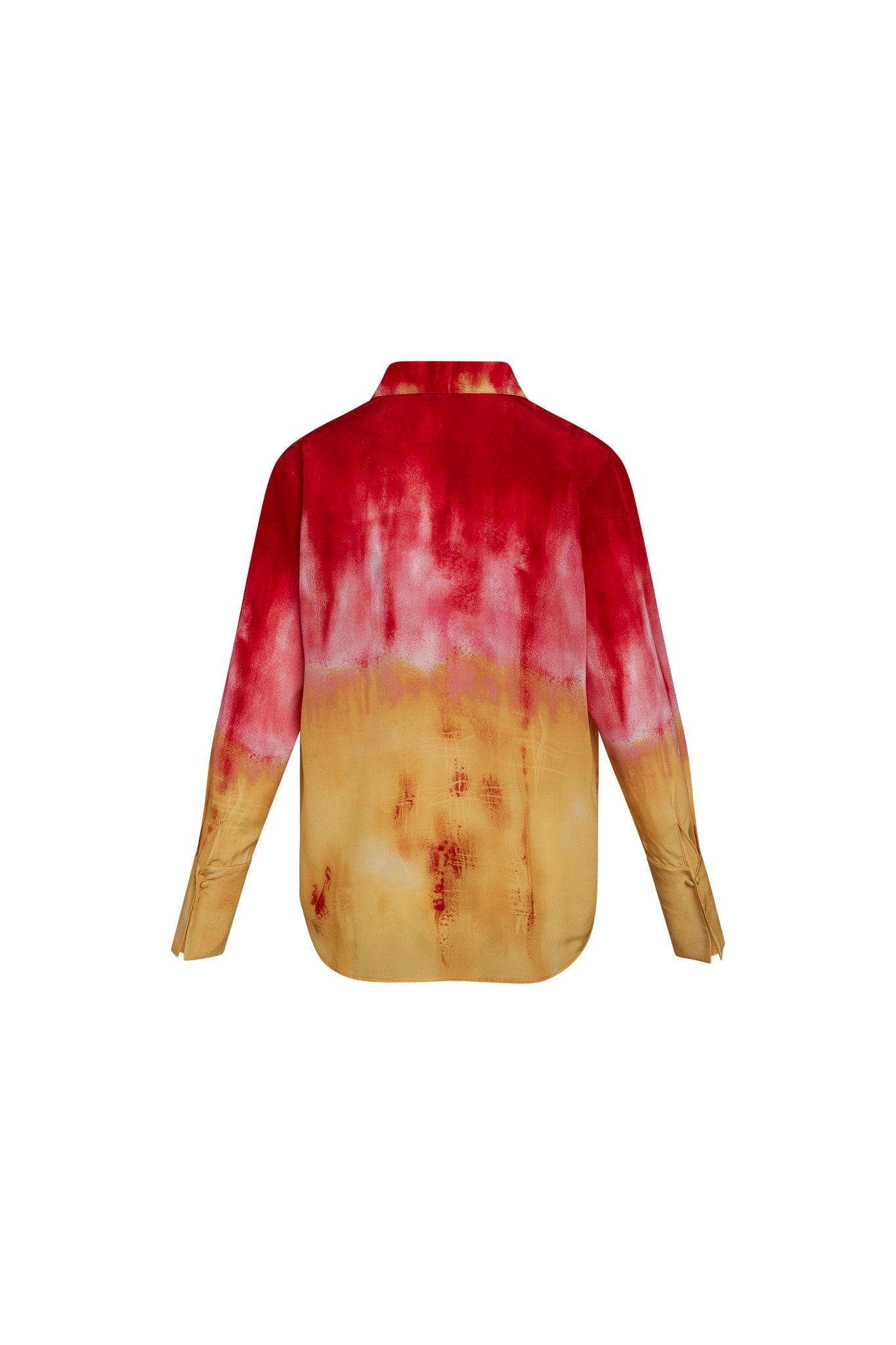 Back-view of a Catherine Gee Daria French Cuff Silk Santa Barbara Sunset blouse features a gradient design that transitions from a deep red at the top to a warm yellow at the bottom, resembling a sunset. The fabric appears to be silk, giving it a smooth and luxurious texture, and has long sleeves with French cuffs and a classic collar, making it both elegant and stylish.