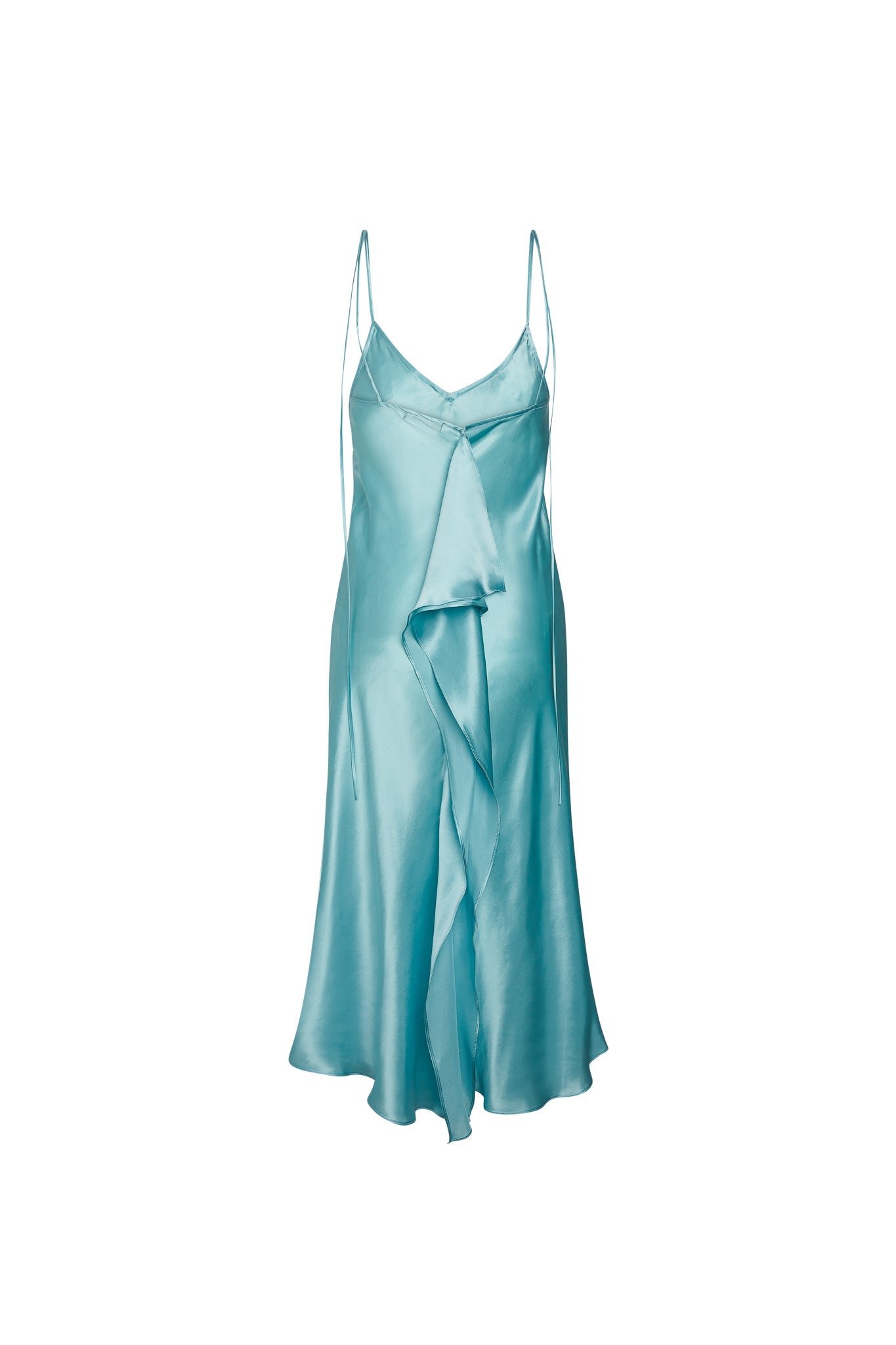 Catherine Gee Emma Sea Foam Slip elegant dress features a delicate sea foam color and is designed with a flowing, silky fabric. It has thin spaghetti straps and a V-neckline, with a cascading ruffle detail down the front. The hemline is asymmetrical, adding a touch of modern sophistication to the classic slip-dress silhouette exudes a sense of effortless elegance and is perfect for both casual and formal occasions.