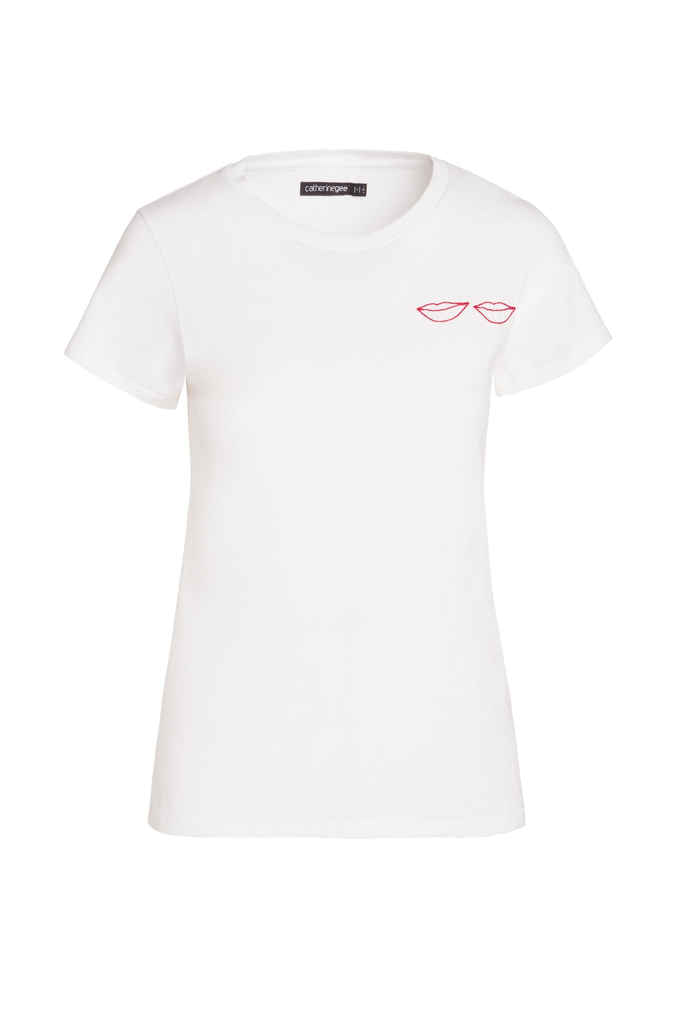 Catherine Gee Embroidered Cotton Lips white short-sleeved, crew-neck t-shirt featuring a minimalist design with two small, red embroidered lips on the left chest area. The t-shirt has a simple and clean aesthetic, making it versatile for casual wear.